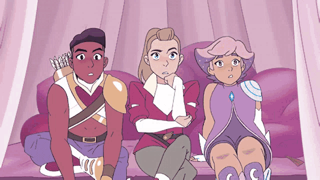 three cartoon characters are sitting on a couch and one has a bow
