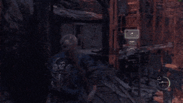 a man in a blue jacket is holding a gun in a video game