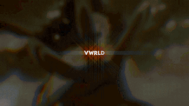 a blurred image with the words vwrld in red
