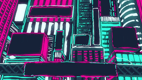 an aerial view of a city at night with lots of buildings