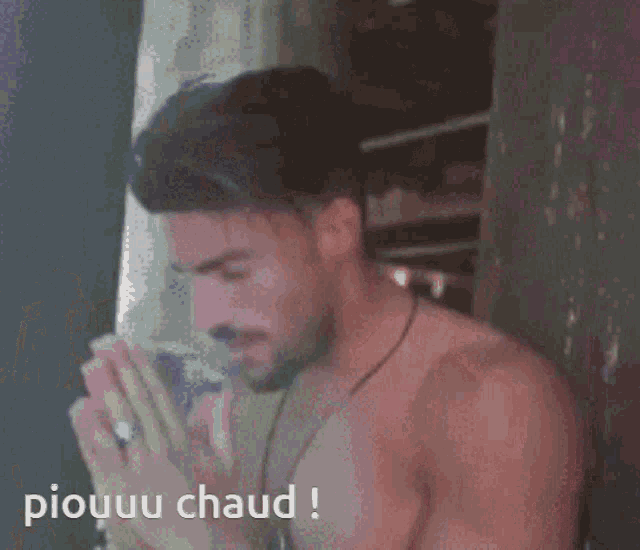 a man without a shirt is praying with his hands folded in front of a window with the words piouuu chaud written on the bottom