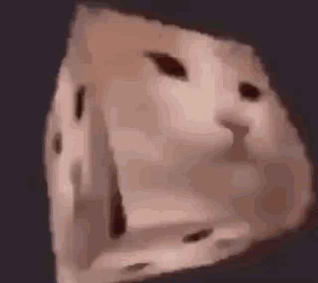 a cube with a cat 's face on it .