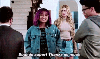 a woman with purple hair and a denim jacket says " sounds super thanks so much "