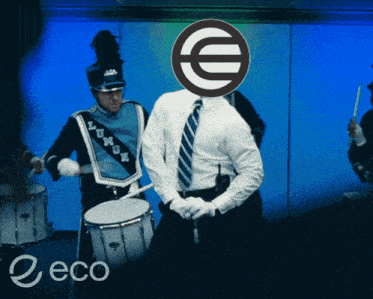 a man in a marching band has a euro symbol on his head