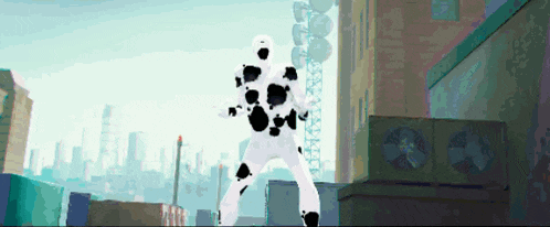 a man in a white suit with black spots is standing in a city