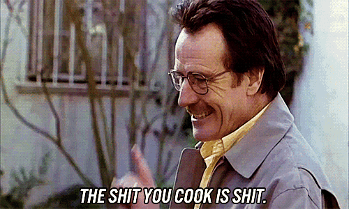 a man wearing glasses and a trench coat says " the shit you cook is shit "