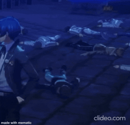 a group of people laying on the ground in a dark room .