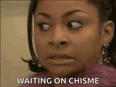 a close up of a woman 's face with the words `` waiting on chisme '' written on it .