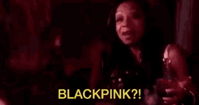 a close up of a woman 's face with the words `` blackpink ? '' written on it .