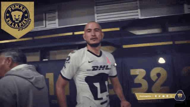 a man in a pumas en la piel jersey