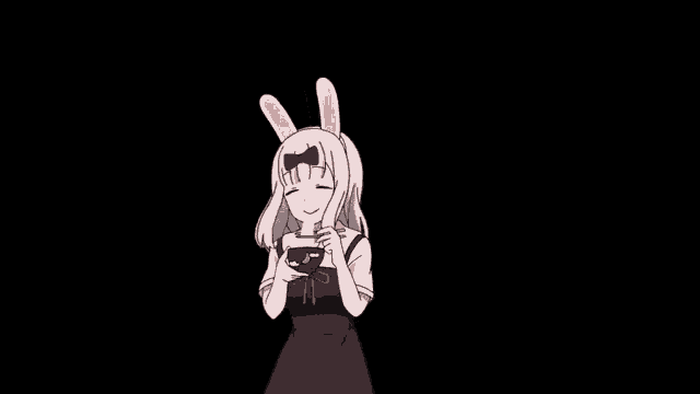 a girl with bunny ears is holding a bowl of food in her hands .