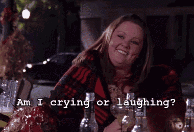 a woman is laughing and crying with the words am i crying or laughing oh good