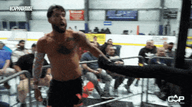 a man in a boxing ring with a caption that says #capm4dhouse