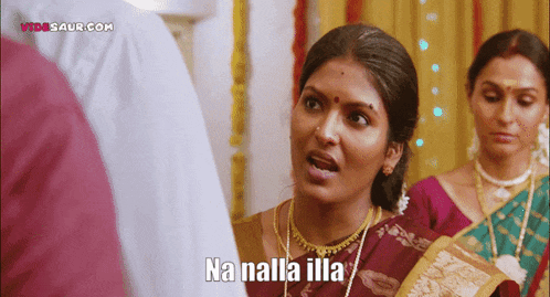 a woman in a red saree says ha nalla illa in a video