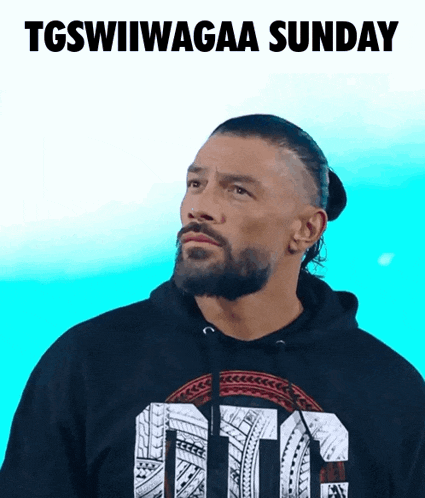 a man with a beard wearing a shirt that says tgswiiwagaa sunday
