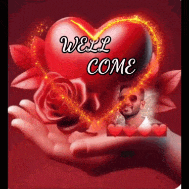 a hand is holding a red heart with the words well come written on it