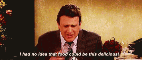a man in a suit and tie is saying i had no idea that food could be this delicious
