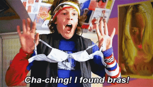 a man is holding a bra and saying cha-ching i found bras ..