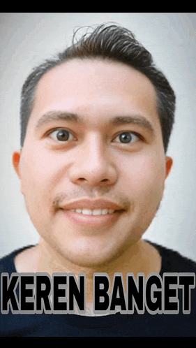 a close up of a man 's face with the words keren banget written below him
