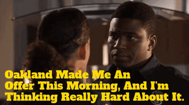 a man and a woman are looking at each other with the caption oakland made me an offer this morning