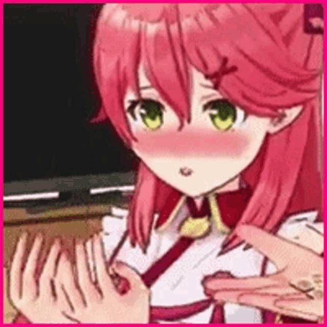 a pink haired anime girl with green eyes is being touched by a person 's hands .