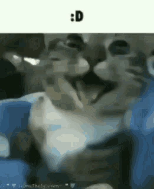 a group of people are sitting in a chair with their mouths open and their faces visible .