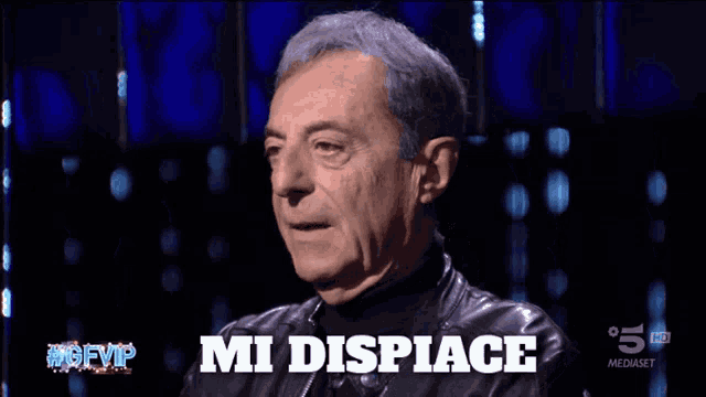 a man in a leather jacket says mi dispiace