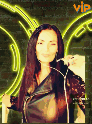 a woman wearing headphones stands in front of a vip sign