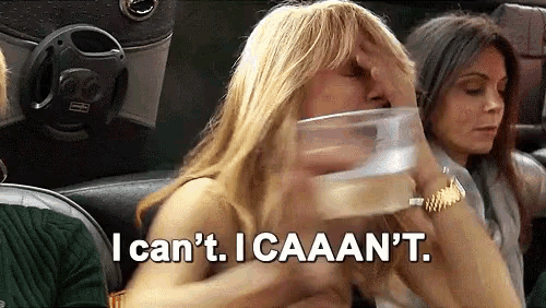 a woman is drinking from a plastic cup and says i can 't . icaaan 't .