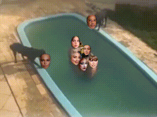 a group of people are swimming in a pool with their faces in the water