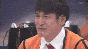 a man is crying in front of a tv screen that says ytv on it