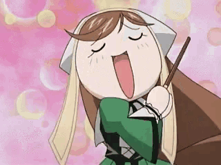 a cartoon girl is holding a stick and making a funny face .