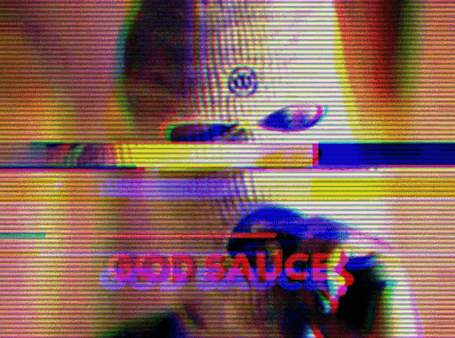 a blurred image of a person with the word god sauces written on it