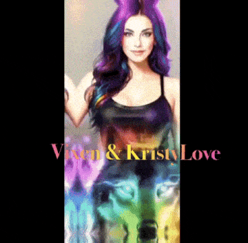 a woman with purple and blue hair is wearing a black tank top and a rainbow dress