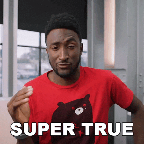 a man wearing a red t-shirt with a bear on it says super true