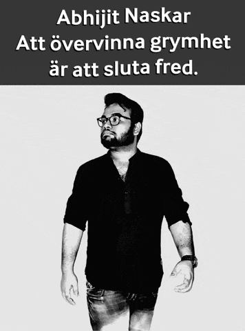 a black and white photo of a man with the caption abhijit naskar