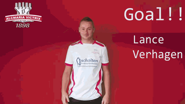 a man covering his ears in front of a banner that says goal lance verhagen