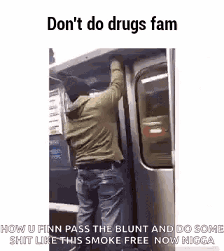 a man is standing on top of a subway car while smoking a cigarette .