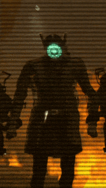 a silhouette of a man with a light on his face
