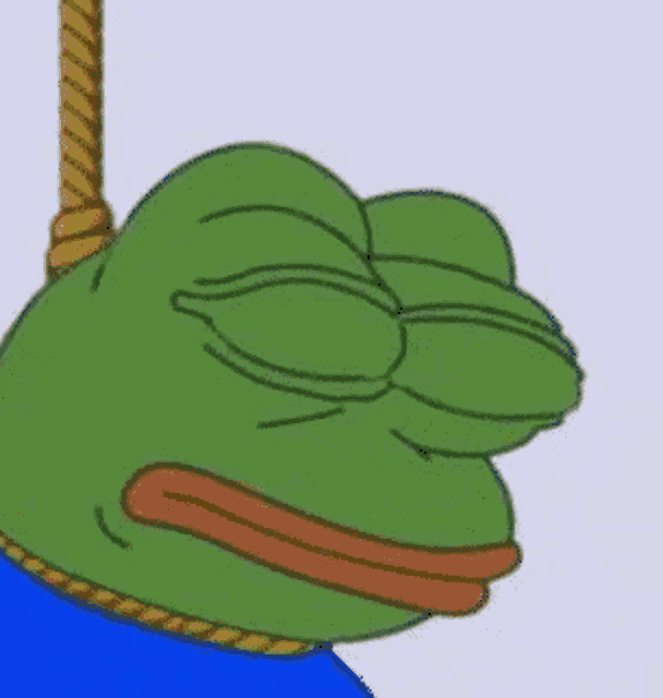 a green frog is hanging from a rope