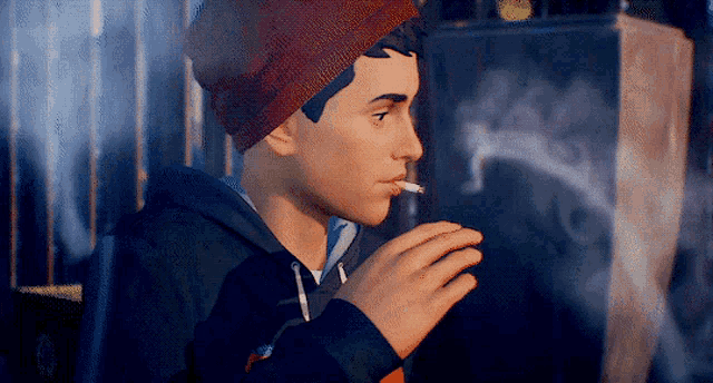 a young man is smoking a cigarette in front of a speaker .