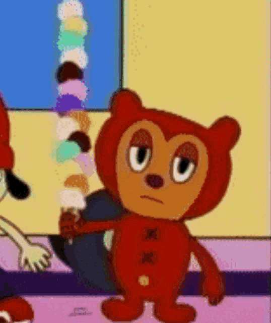 a cartoon bear is holding an ice cream cone in his hand