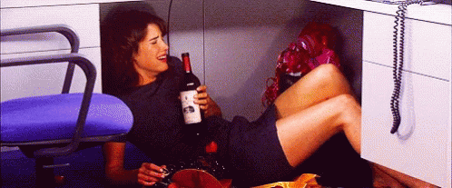 Robin Crying Under Her Desk Winesday GIF - Robin Crying Under Her Desk Winesday Drinking Wine GIFs