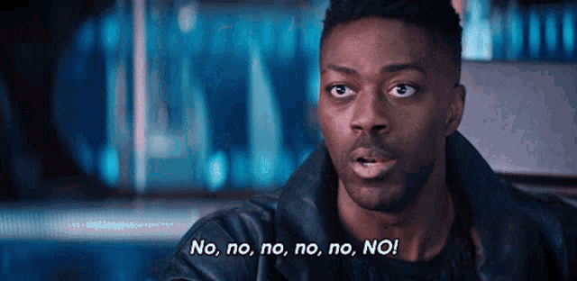 a man in a leather jacket is saying no , no , no , no , no .