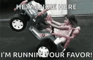 a little girl is riding a toy car with a doll on the back .