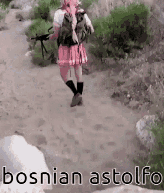 a woman carrying a gun on a dirt path with bosnian astolfo written below her