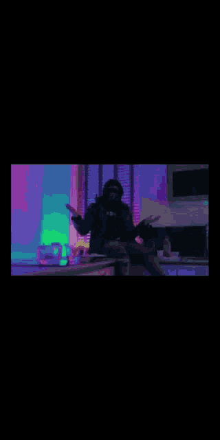 a man in a mask is standing in a dark kitchen