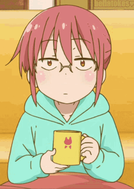 a girl with pink hair and glasses is holding a cup with a cat on it