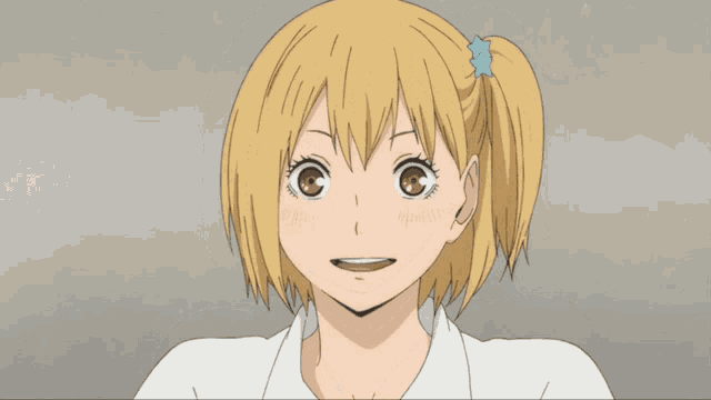 a girl with blonde hair and a star in her hair