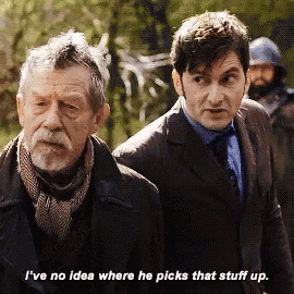 two men standing next to each other with one saying i 've no idea where he picks that stuff up .